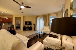 House (Gated Community! Sparkling private po) | Living room | TV, table football - Sunset Lake Villa by Orlando Short Term (Kissimmee)