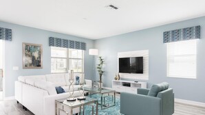 House (Champions Gate Resort, game room, pri) | Living room | TV - Caribe Isle by Orlando Short Term (Davenport)