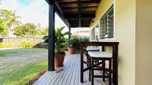 Terrace/patio - Vaima Studio -steps from the best beach + value for money, air con, free WIFI ! (Vaimaanga Tapere)