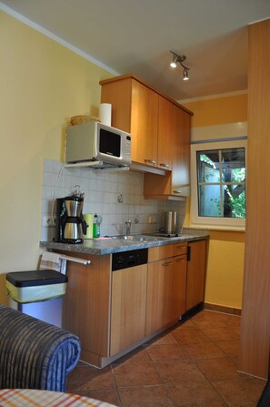 Fridge, microwave, dishwasher, coffee/tea maker