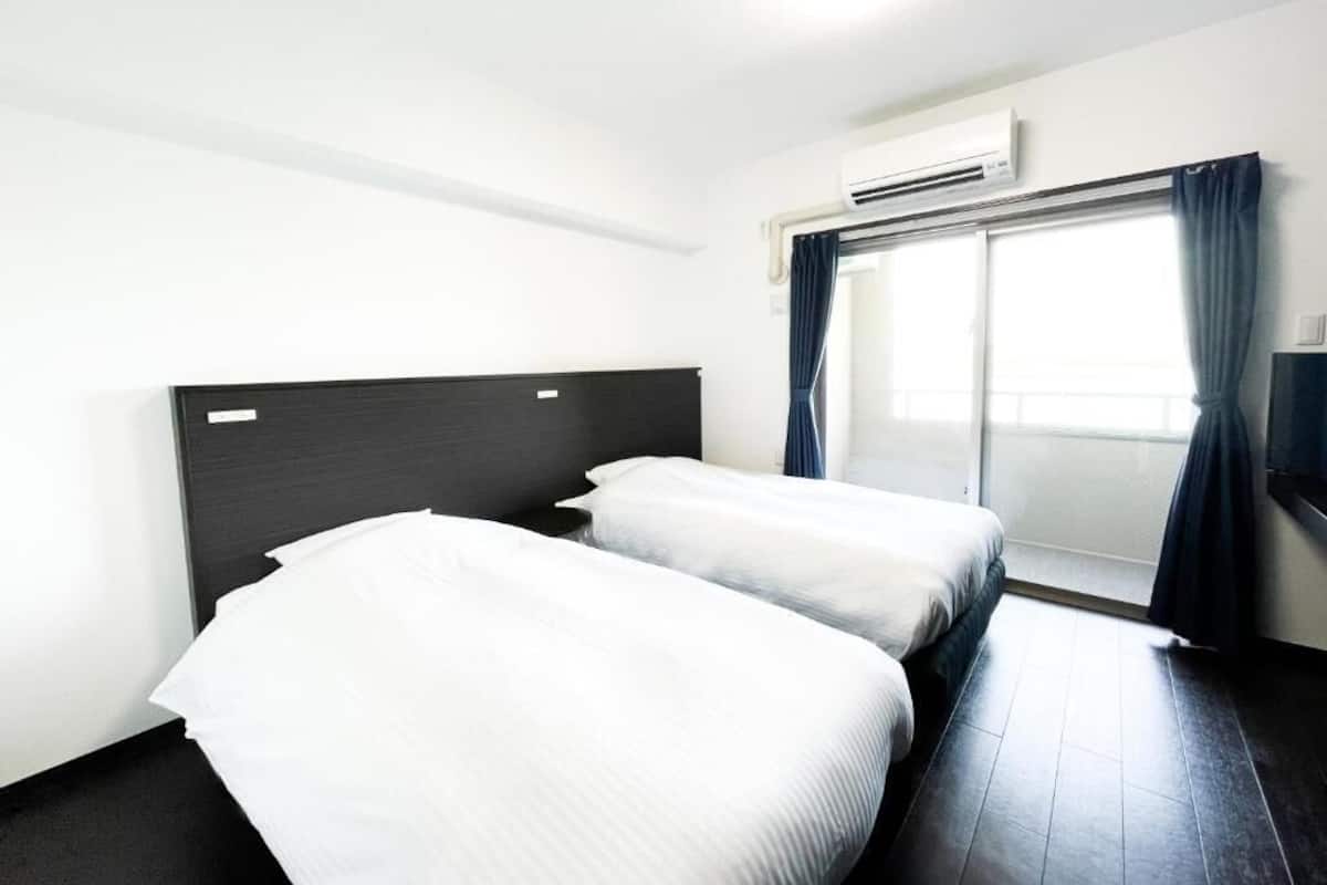 2 bedrooms, blackout curtains, iron/ironing board, free WiFi