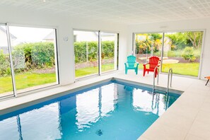 Alberca techada y alberca climatizada