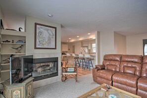 TV, fireplace - Lakefront De Tour Village Home w/ Deck & Fire Pit! (De Tour Village)