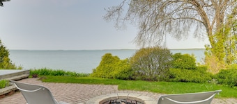 Lakefront De Tour Village Home w/ Deck & Fire Pit!