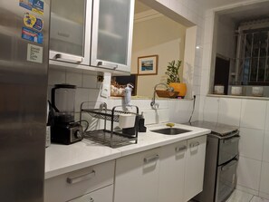 Microwave, coffee/tea maker, cookware/dishes/utensils