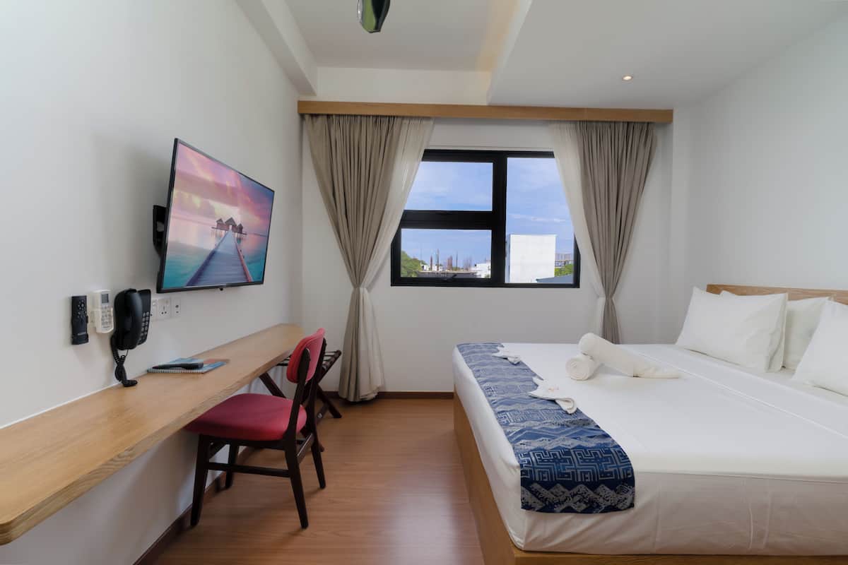 In-room safe, desk, laptop workspace, blackout curtains