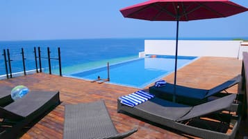 Outdoor pool, open 7:00 AM to 6:00 PM, sun loungers