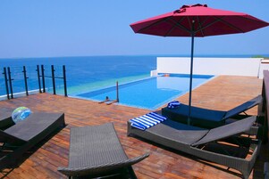 Outdoor pool, open 7:00 AM to 6:00 PM, sun loungers