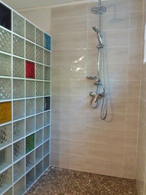 Shower, hair dryer, towels, soap