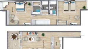 Un appartement en duplex comprenant une chambre, un salon/salle à manger, une cuisine et une terrasse.
