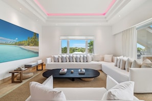 Luxury Penthouse, 2 Bedrooms, Balcony, Ocean View | Living area | LED TV