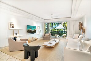 Spacious 2 Bedroom 2 Bathroom Suite (E1) | Living area | LED TV - The Yacht Club TC (Providenciales)