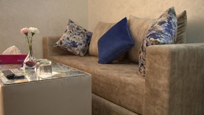 Quarto triplo luxo | Área de estar