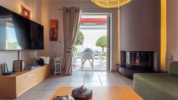 Taulutelevisio, takka, stereot