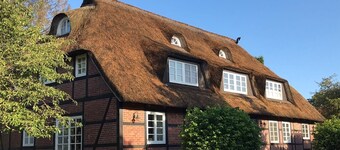 Reet und Meer - Reetdachhaus Beckerwitz, Apartment lake view with sea view