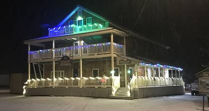 Majestic recreational Lodging w/ Snowmobile and Side x Side rentals on Long Lake