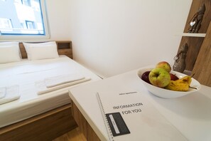 1 غرفة نوم ومكواة/لوح كي وواي فاي مجانًا وملاءات أسرّة