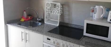 Fridge, oven, electric kettle, toaster