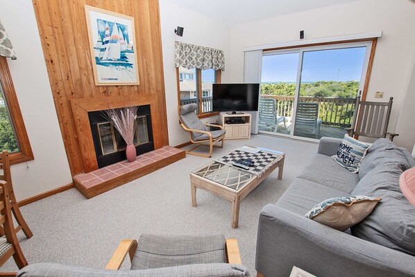 TV, fireplace, table football, books