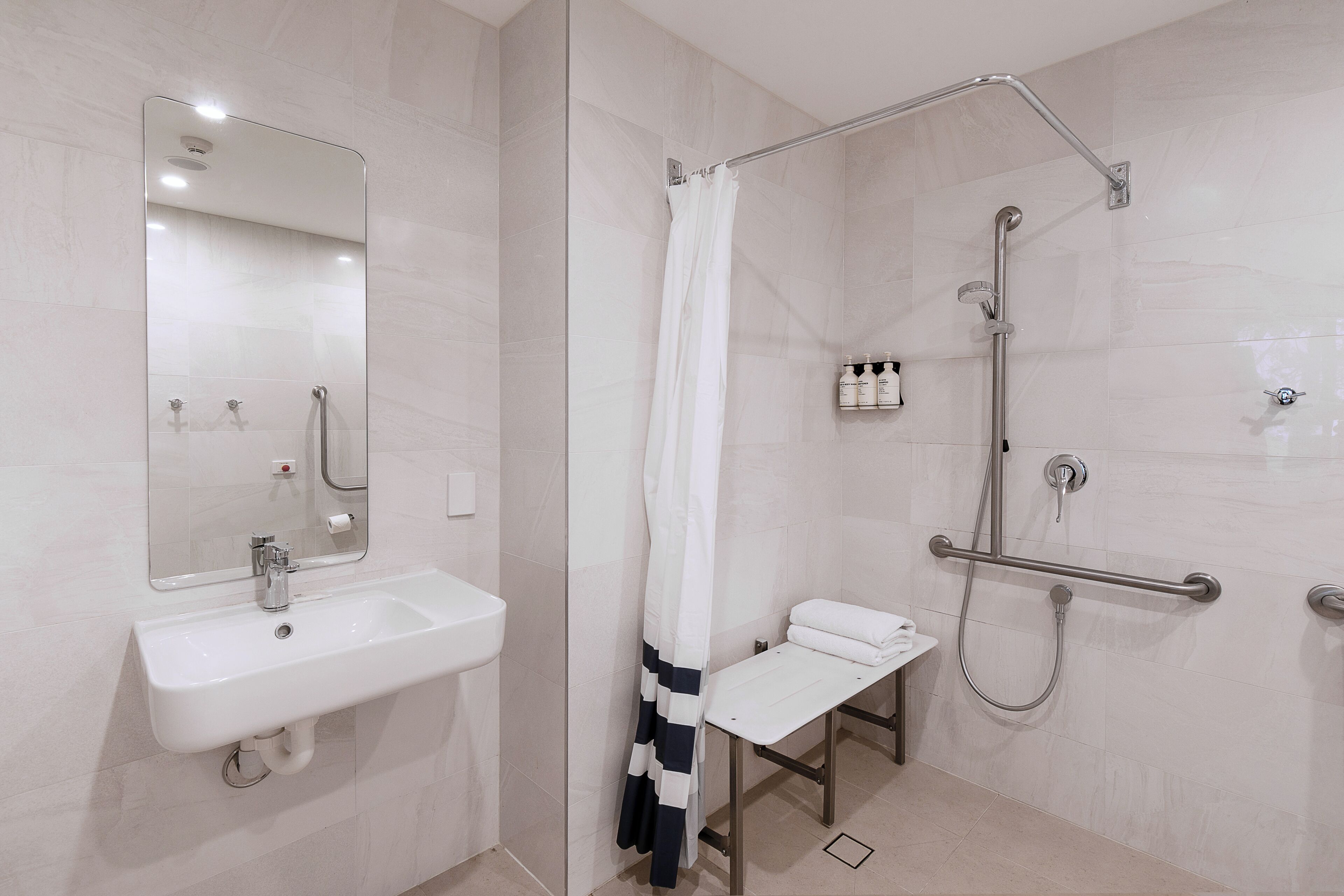 queen room with balcony (accessible facilities in selected rooms) | bathroom | shower, eco-friendly toiletries, hair dryer, towels