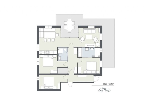 Ein Grundriss eines Hotelzimmers mit Küche, Essbereich, Bad und Wohnzimmer.