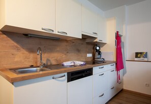 Fridge, microwave, dishwasher, coffee/tea maker