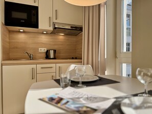 Fridge, coffee/tea maker, electric kettle, toaster