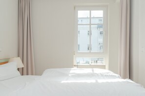 2 quartos, berço de viagem, Wi-Fi, roupa de cama