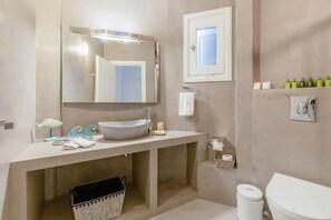 Combined shower/tub, hair dryer, towels, soap