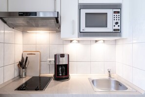 Fridge, microwave, coffee/tea maker, electric kettle