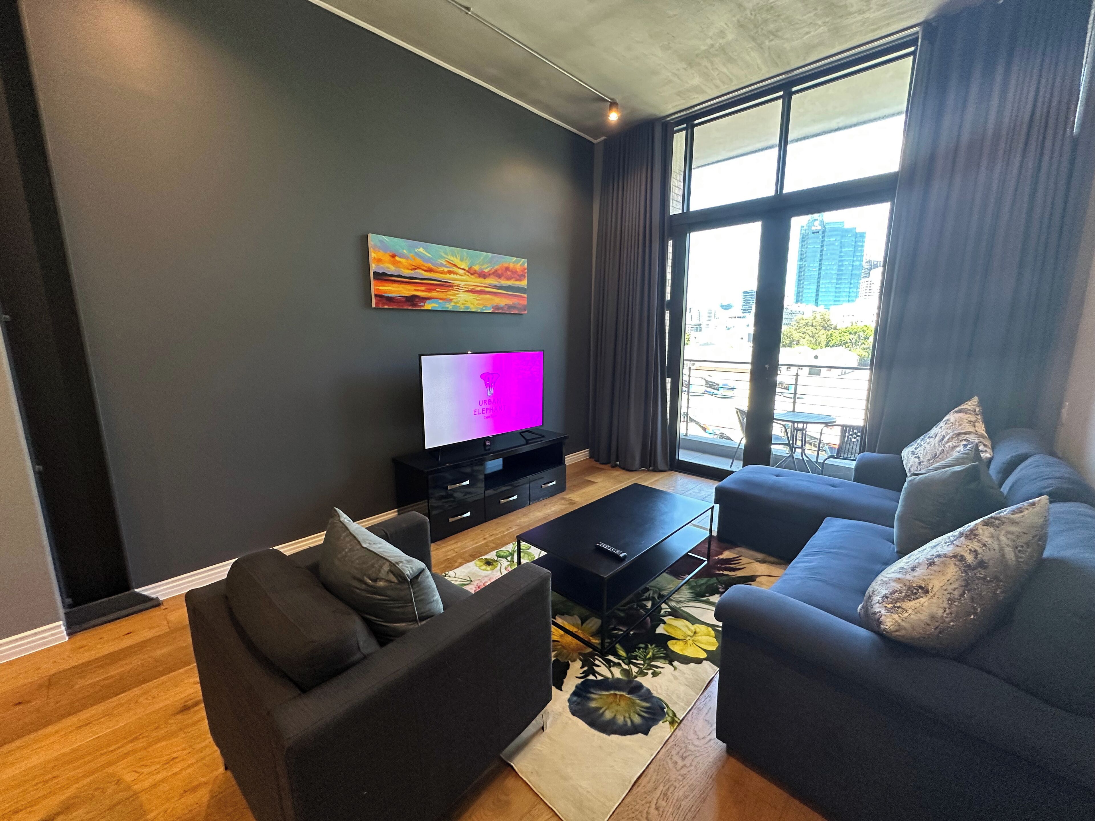 Apartment 214 | Living area | 50-inch Smart TV with digital channels, TV, Netflix