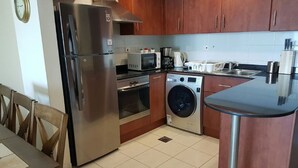 Comfort Apartment | Private kitchenette | Full-sized fridge, microwave, oven, stovetop - Beautiful 1Bedroom apartment Near Metro (Dubai)