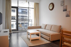 Deluxe Apartment | Living area | LCD TV