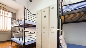 A dormitory room with bunk beds, a window with blinds, and a set of lockers. - Hotel O Kuantan Backpackers (Kuantan)