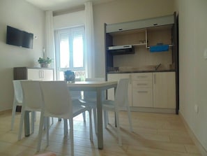 Appartement Standard, 1 chambre | Repas dans la chambre