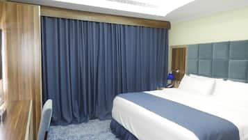 Comfort Room, 1 Bedroom | Minibar, in-room safe, individually decorated, individually furnished