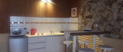 Fridge, microwave, electric kettle, toaster