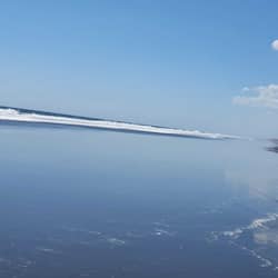 Private beach, black sand, beach umbrellas, beach towels
