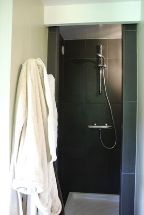 Bathtub, hair dryer, towels