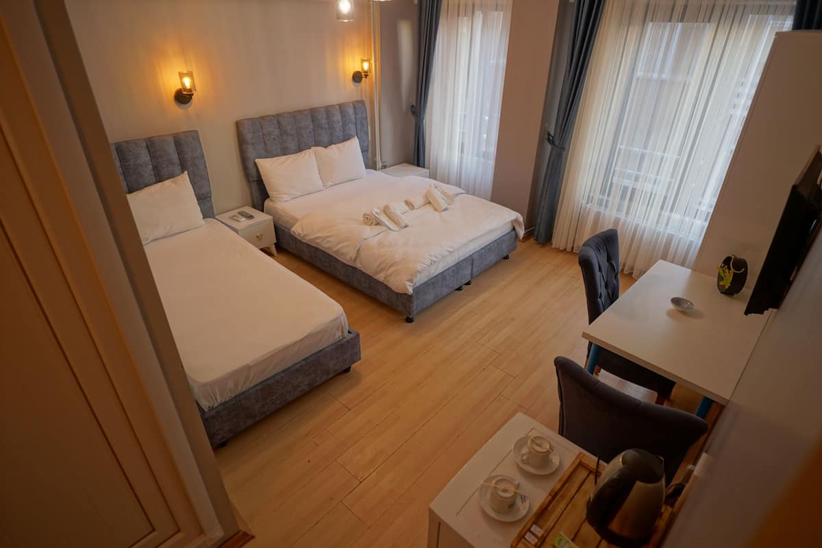 Standard Triple Room | Premium bedding, individually decorated, laptop workspace, soundproofing