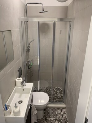 Hair dryer, towels, soap, shampoo