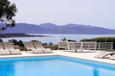 Seasonal outdoor pool, pool umbrellas, sun loungers