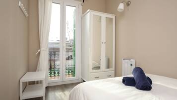 2 dormitorios, tabla de planchar con plancha, Internet y ropa de cama