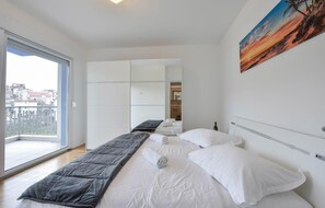 2 quartos, Wi-Fi de cortesia, roupa de cama