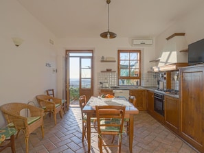 Oven, dishwasher, high chair, dining tables