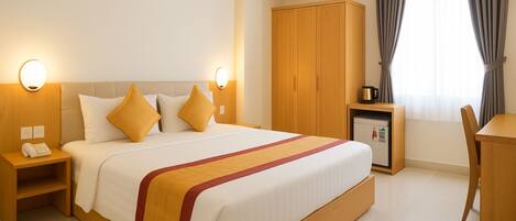 Minibar, desk, laptop workspace, blackout drapes