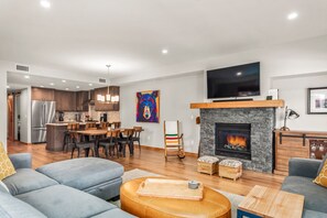 Smart TV, fireplace, books