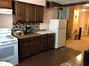 Fridge, oven, cookware/dishes/utensils
