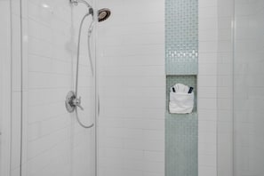 Combined shower/tub, hair dryer, towels, soap