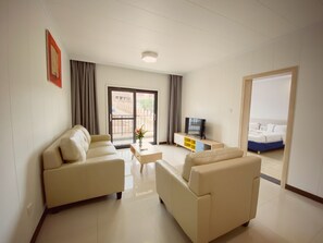 Appartement Deluxe, 1 chambre | Coin séjour